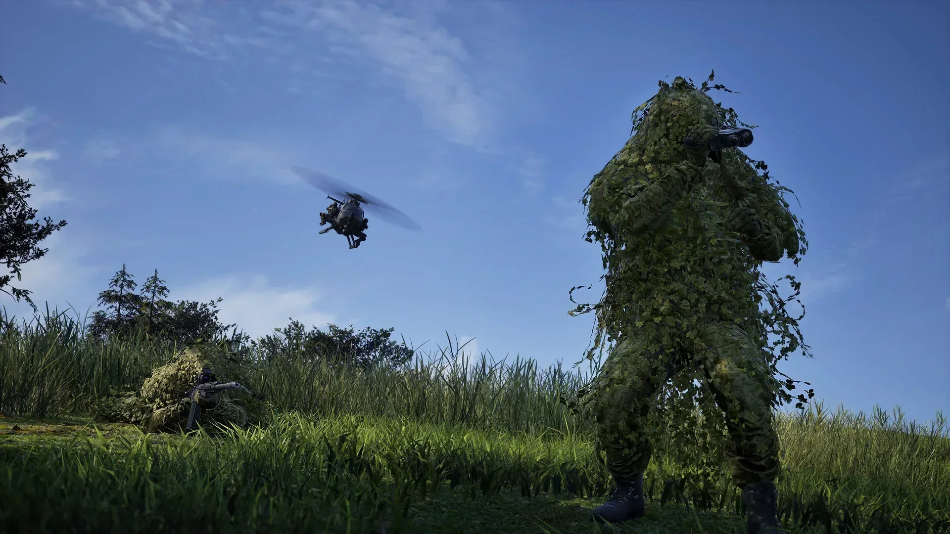 WARDOGS camouflaged soldiers watching a helicopter in open terrain
