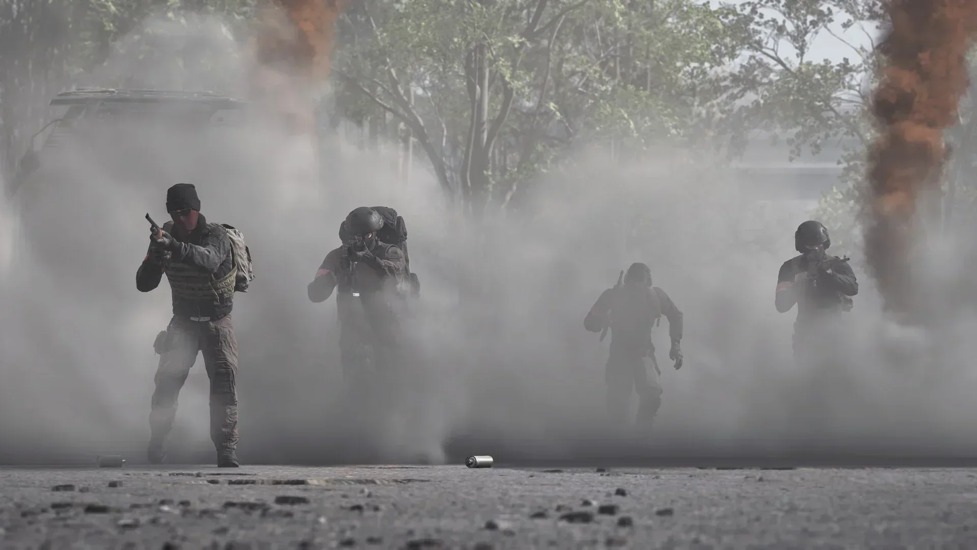WARDOGS soldiers advancing through smoke during a firefight
